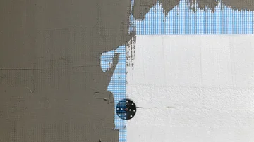 Wall Isolierung styrofoam, mesh und Stößel - Stock-Fotografie